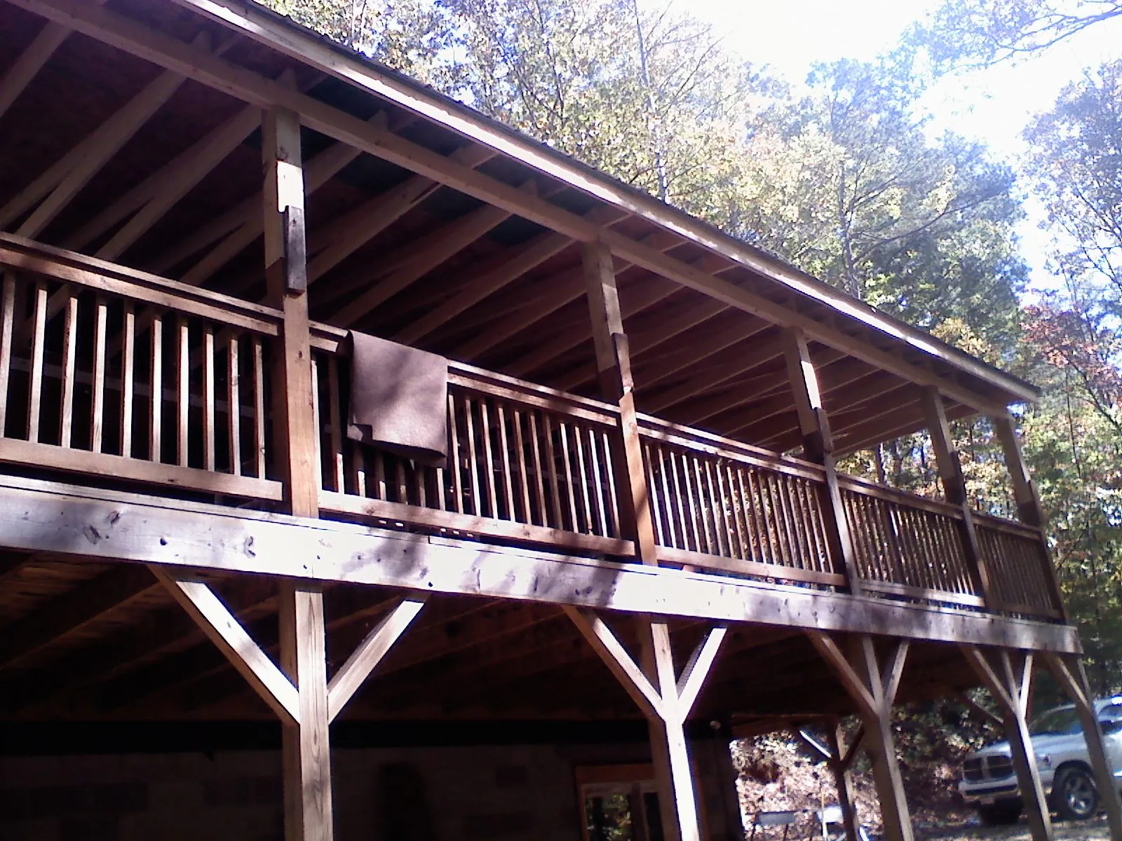 Timber framing under a new elevated porch and deck — Roof Leak Repair in Bryan by Roofing Brothers